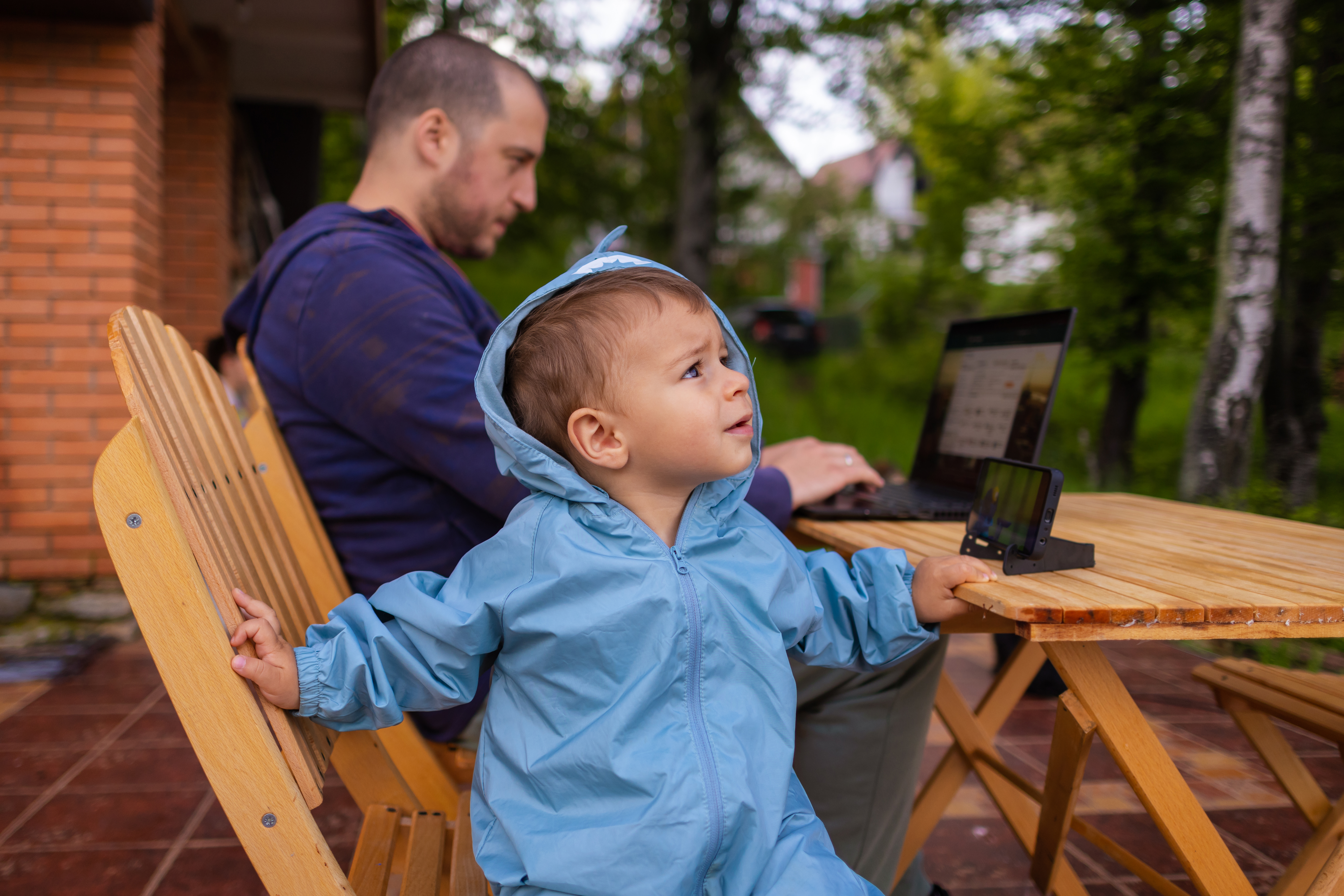 Denali kidcare toddler and son outside